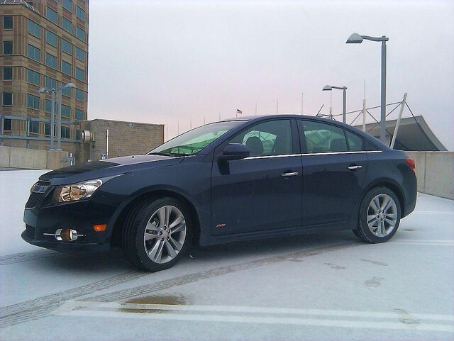 2011 Chevrolet Cruze LTZ RS Side Profile on Snowy Rooftop