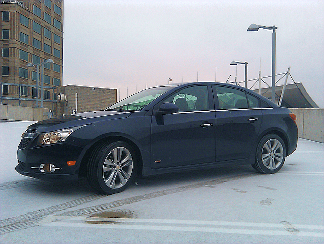 2011 Chevrolet Cruze LTZ RS Front Three-Quarter on Snowy Rooftop