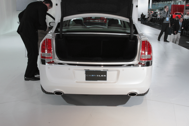 2011 Chrysler 300 white trunk open rear view at auto show