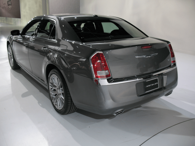2011 Chrysler 300 gray rear passenger-side three-quarter view