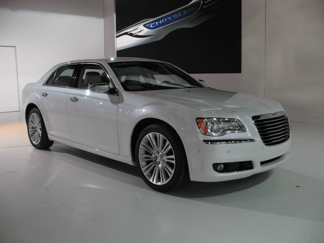2011 Chrysler 300 white front three-quarter view at auto show