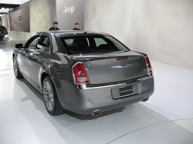 2011 Chrysler 300 gray rear three-quarter view at auto show
