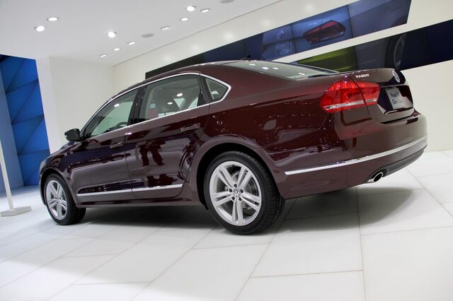 2012 Volkswagen Passat TDI rear three-quarter view deep maroon auto show