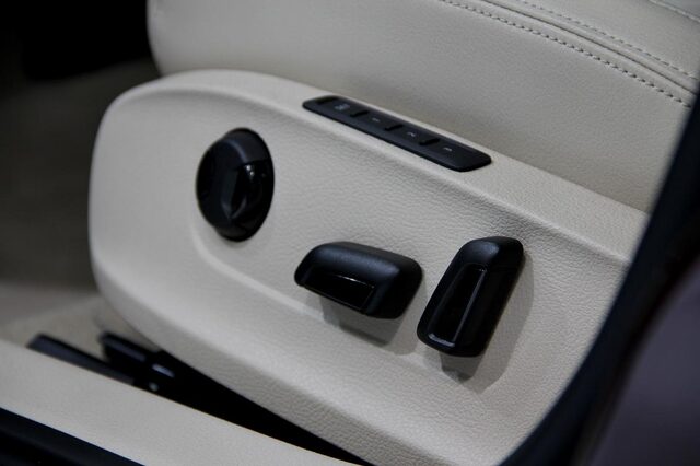 2012 Volkswagen Passat SEL front seat leather armrest detail cream