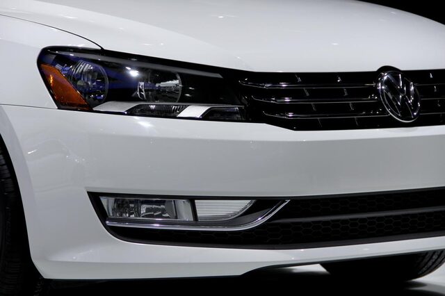 2012 Volkswagen Passat front headlight and grille closeup white