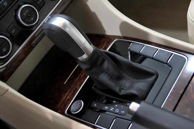 2012 Volkswagen Passat SEL center console gear selector and wood trim detail