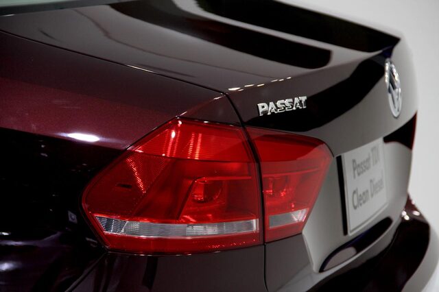 2012 Volkswagen Passat TDI trunk lid badge and taillight closeup deep maroon