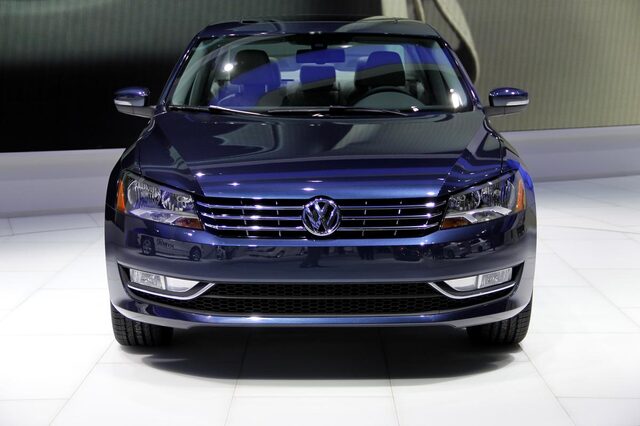 2012 Volkswagen Passat TDI front three-quarter overhead view dark blue auto show