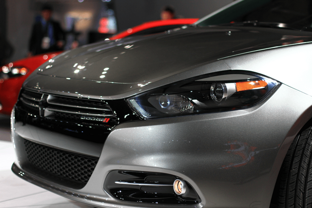 2013 Dodge Dart Limited headlight and grille tight close-up at NAIAS 2012