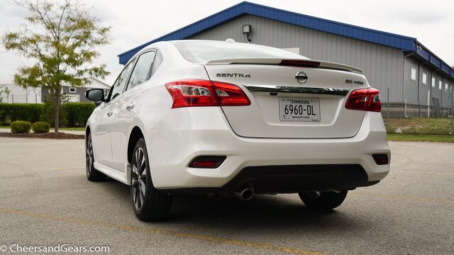 2017 Nissan Sentra SR Turbo in White Rear Three-Quarter View Showing SR Turbo Badge and Dual Exhaust
