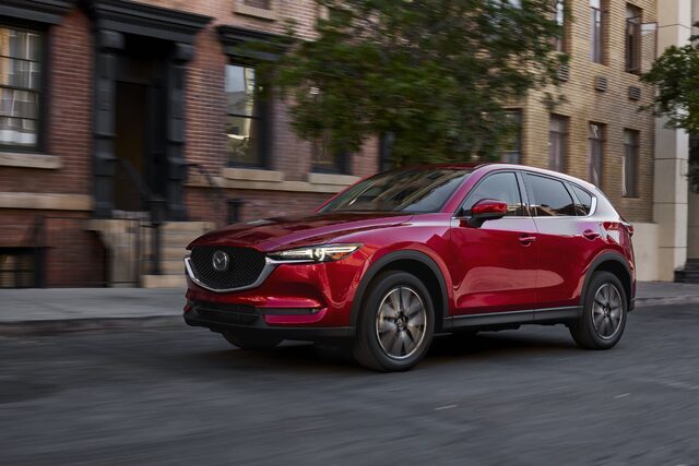 2017 Mazda CX-5 Grand Touring front three-quarter driving city