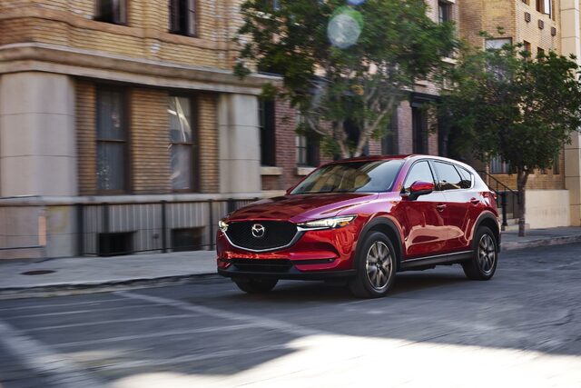 2017 Mazda CX-5 Grand Touring front three-quarter driving urban