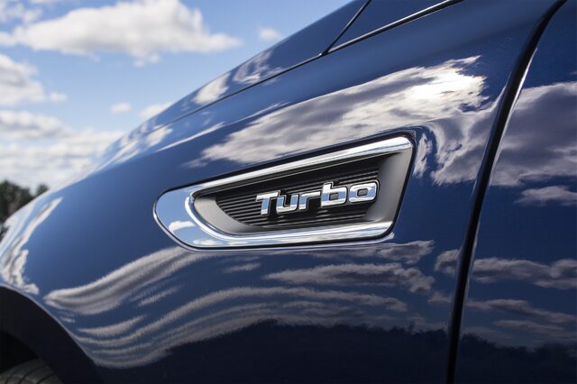 2016 Kia Optima SXL Turbo Fender Badge Closeup on Phantom Blue Metallic Body Panel