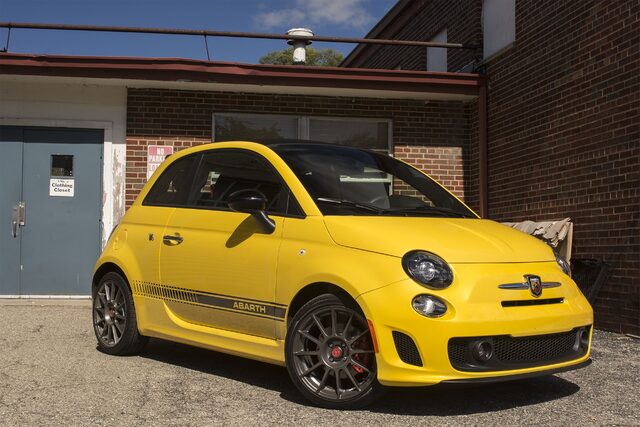 2016 Fiat 500C Abarth Front Three-Quarter View with Abarth Side Stripe by Red Brick Building