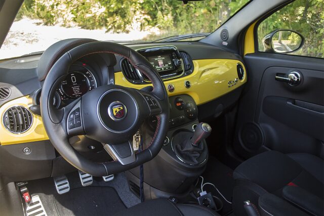 2016 Fiat 500C Abarth Interior with Scorpion Steering Wheel Yellow Dashboard and Five-Speed Manual Shifter