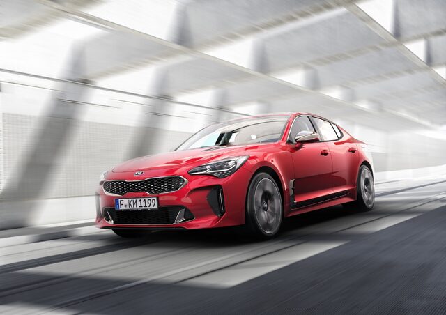 2018 Kia Stinger GT, Front Three-Quarter View in Urban Setting