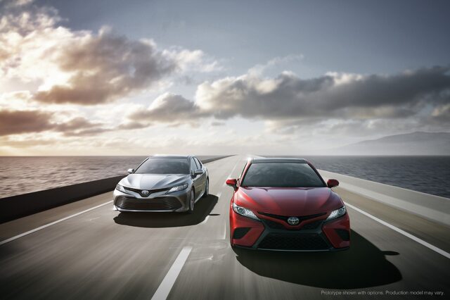 2018 Toyota Camry Silver and Red Models Driving on Coastal Road