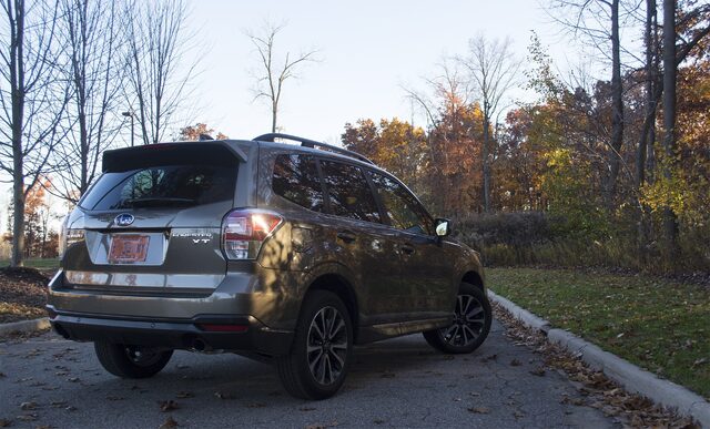2017 Subaru Forester 2.0XT Touring Rear Three-Quarter View with Forester XT Badge in Fall Foliage