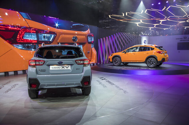 2018 Subaru XV Crosstrek silver and orange models at Geneva world premiere