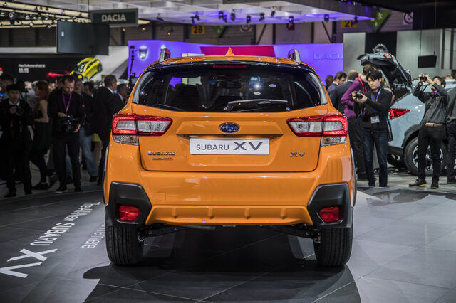 2018 Subaru XV Crosstrek Solar Orange straight-on rear view at Geneva