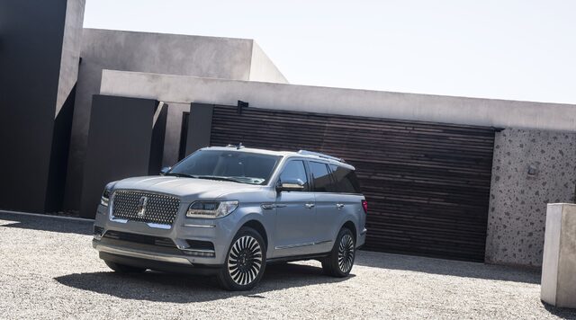 2018 Lincoln Navigator Exterior Front Three-Quarter Against Modern Architecture