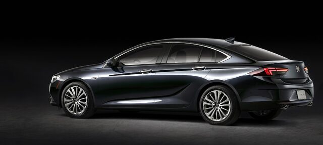2018 Buick Regal Sportback studio rear three-quarter view black background