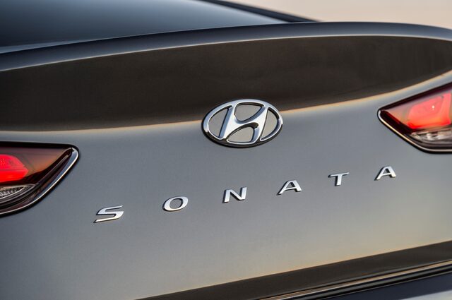 2018 Hyundai Sonata Sport gray sedan Hyundai badge and Sonata lettering on trunklid closeup