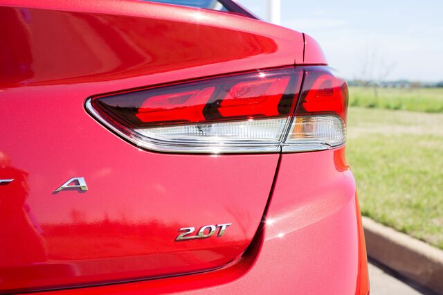 2018 Hyundai Sonata Sport 2.0T red sedan rear taillight and 2.0T badge detail