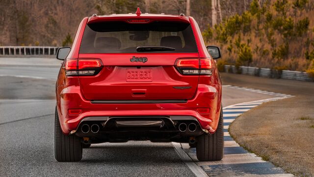 2018 Jeep Grand Cherokee Trackhawk Red Rear View Quad Exhaust on Race Track
