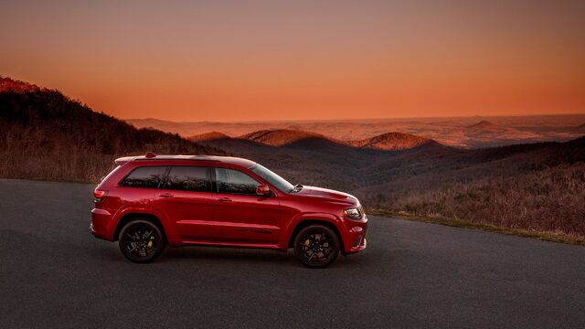 2018 Jeep Grand Cherokee Trackhawk Red Mountain Overlook Side Profile at Sunset