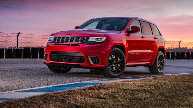 2018 Jeep Grand Cherokee Trackhawk Red at Racetrack Sunset Front Three-Quarter