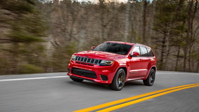 2018 Jeep Grand Cherokee Trackhawk Red Front Three-Quarter Rolling Shot