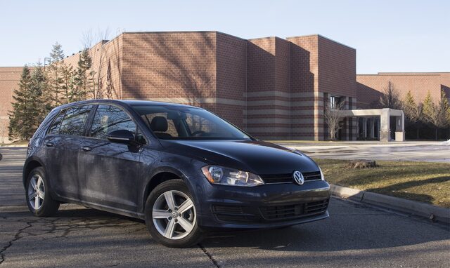 2017 Volkswagen Golf Wolfsburg Edition Front Three-Quarter View in Front of Brick Building