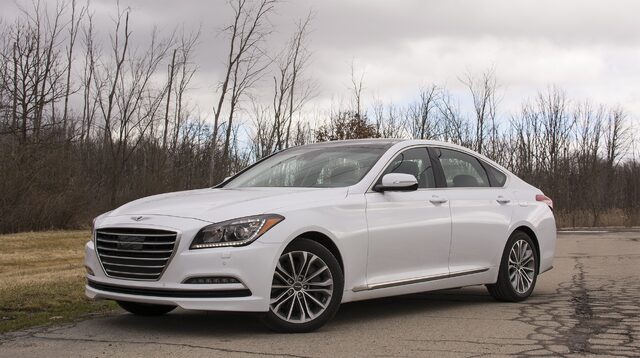 2017 Genesis G80 3.8 HTRAC Front Three-Quarter View with Bare Trees in Background