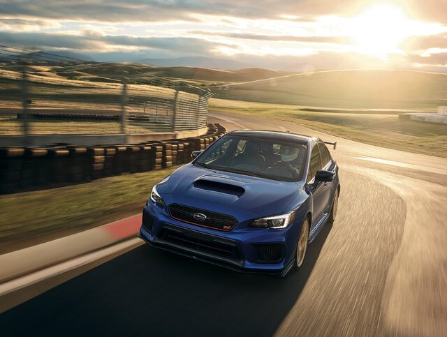 2018 Subaru WRX STI RA front three-quarter action shot on track