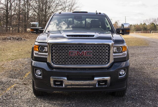 2017 GMC Sierra Denali 2500HD direct front view showing GMC grille and fog lights