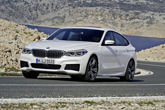 2018 BMW 6-Series GT front three-quarter view on mountain road