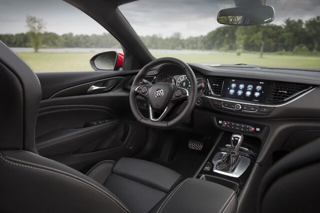 2018 Buick Regal GS, driver-focused interior with sport steering wheel and infotainment