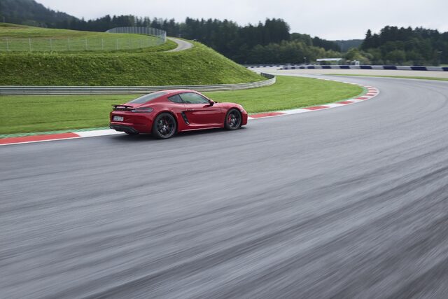 2018 Porsche 718 Cayman GTS rear three-quarter on track