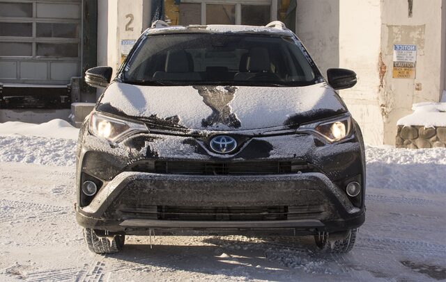 2017 Toyota RAV4 Hybrid XLE Straight Front View in Winter Snow