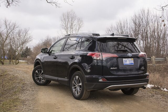 2017 Toyota RAV4 Hybrid XLE Rear Three-Quarter View in Winter