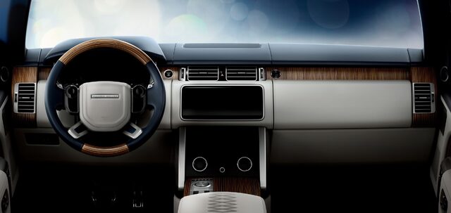 2019 Land Rover Range Rover SV Coupe — Interior Dashboard With Wood Veneer and Portrait Touchscreen