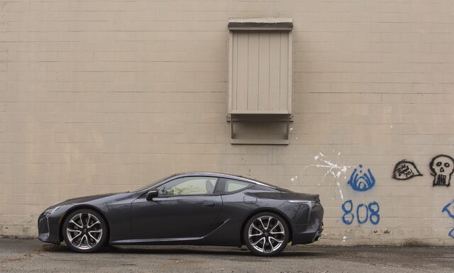 2018 Lexus LC 500 parked beside urban wall
