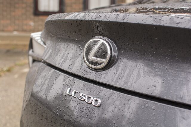 2018 Lexus LC 500 trunk badge close-up in rain