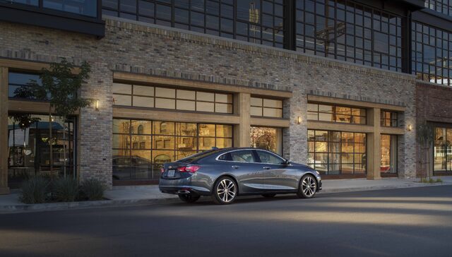 2019 Chevrolet Malibu Rear Three-Quarter View at Industrial Building