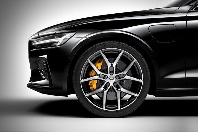 2019 Volvo S60 Polestar Engineered wheel and yellow brake caliper detail