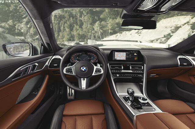 2019 BMW M850i xDrive interior wide view with navigation