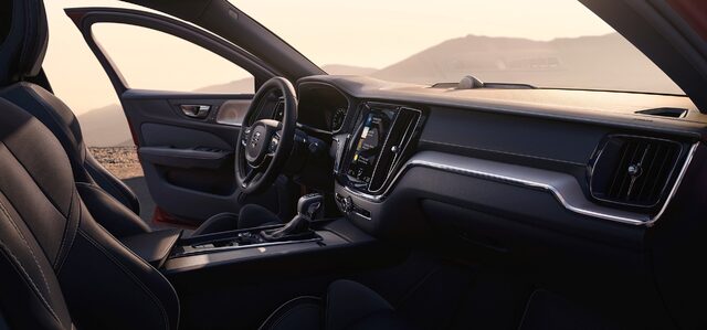 2019 Volvo S60 sport interior with dark trim and Sensus touchscreen