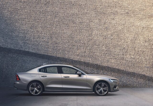 2019 Volvo S60 Inscription, profile view against textured wall