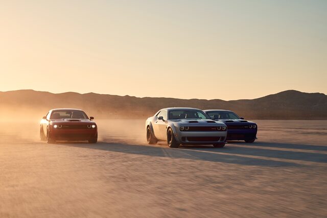2019 Dodge Challenger, three-car lineup driving on desert salt flat
